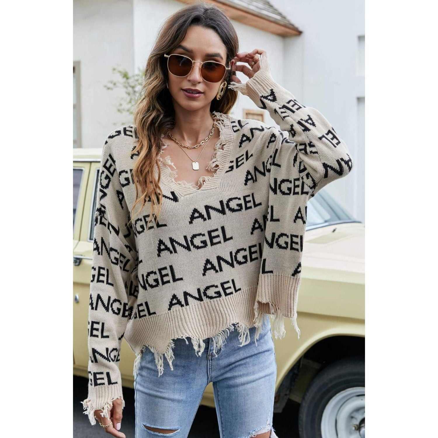 ANGEL Distressed V-Neck Dropped Shoulder Sweater - TiffanyzKlozet